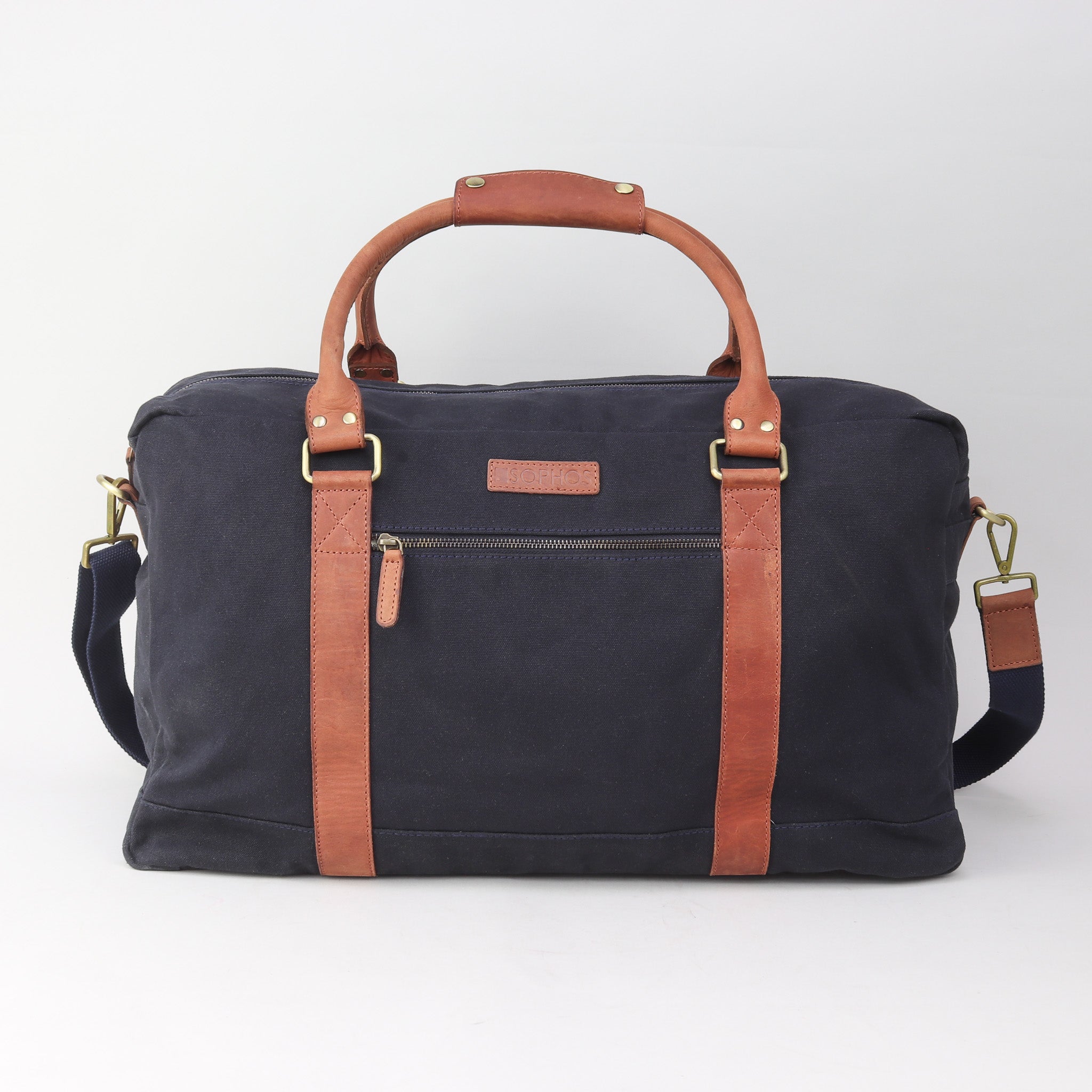 Beautiful navy waxed canvas weekend holdall bag with leather straps